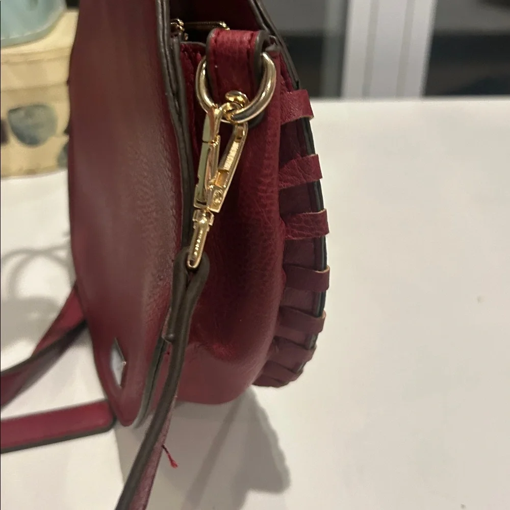 Carlos Santana faux pebbled leather maroon western crossbody bag laser cut rings